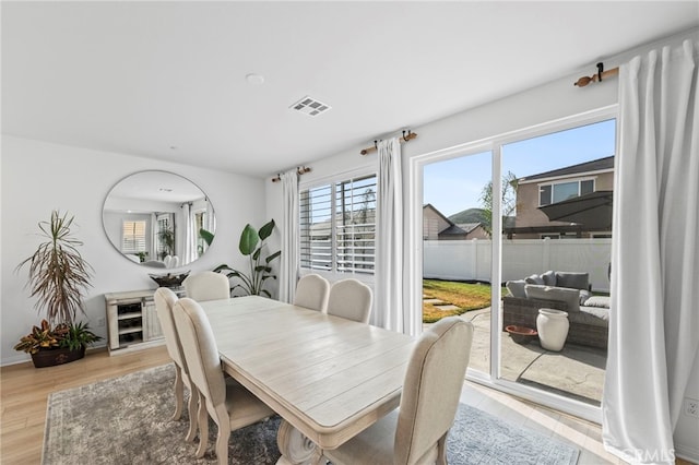 5053 Moon Eye Way, Hemet, CA 92545 - dining area featuring visible vents and light wood finished floors