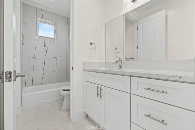 bathroom featuring toilet, shower / tub combination, and vanity