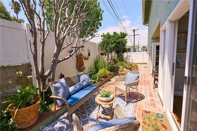 385 Park Ave, Long Beach, CA 90814 - view of patio / terrace with a fenced backyard and an outdoor hangout area