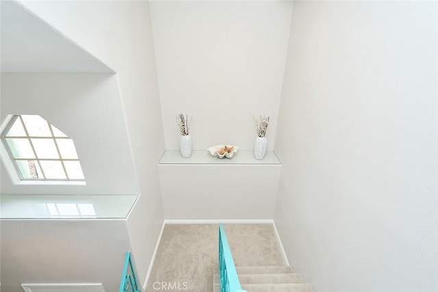 385 Park Ave, Long Beach, CA 90814 - staircase featuring carpet floors and baseboards