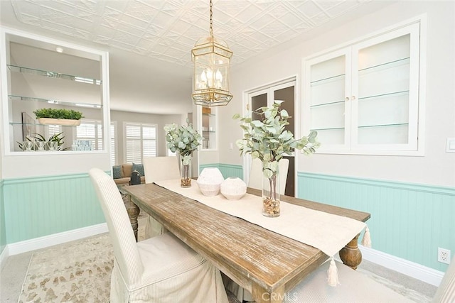385 Park Ave, Long Beach, CA 90814 - dining room with a notable chandelier and wainscoting