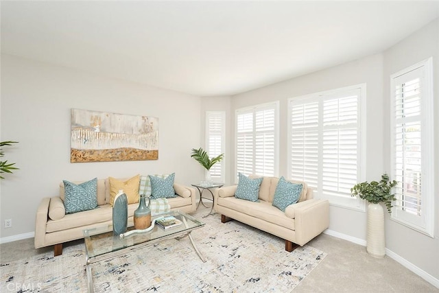 385 Park Ave, Long Beach, CA 90814 - carpeted living room featuring baseboards and a wealth of natural light