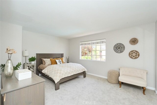 385 Park Ave, Long Beach, CA 90814 - bedroom with baseboards and light colored carpet