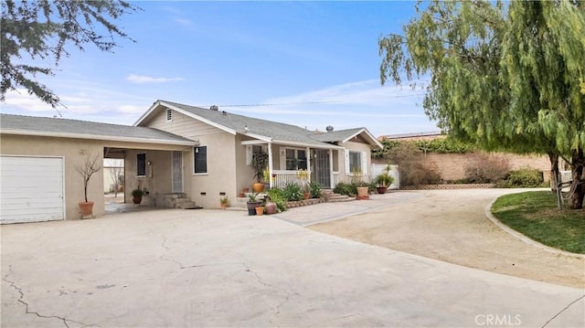 681 E Washington Ave, San Jacinto, CA 92583 - single story home with driveway, stucco siding, and a garage