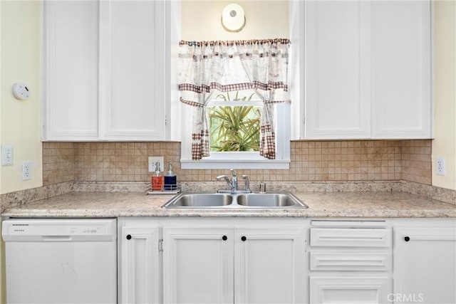 681 E Washington Ave, San Jacinto, CA 92583 - kitchen with white dishwasher, a sink, white cabinetry, and light countertops