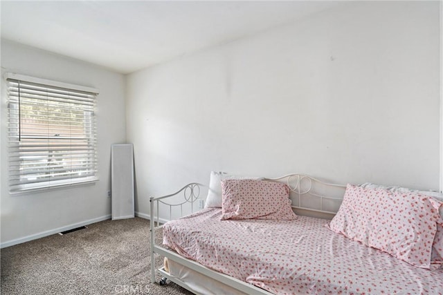 681 E Washington Ave, San Jacinto, CA 92583 - carpeted bedroom with baseboards