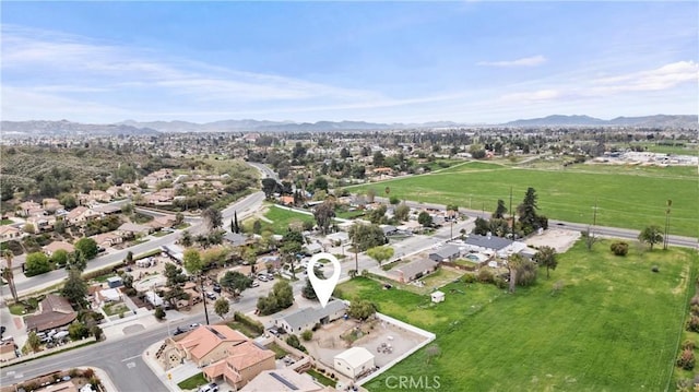 681 E Washington Ave, San Jacinto, CA 92583 - aerial view of property and surrounding area with a mountainous background and nearby suburban area