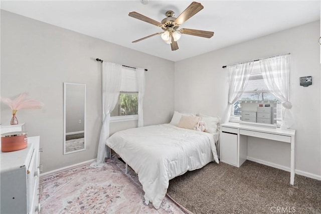 681 E Washington Ave, San Jacinto, CA 92583 - bedroom with baseboards, ceiling fan, and carpet flooring