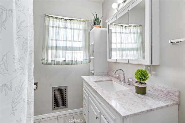 681 E Washington Ave, San Jacinto, CA 92583 - bathroom featuring vanity and tile patterned floors
