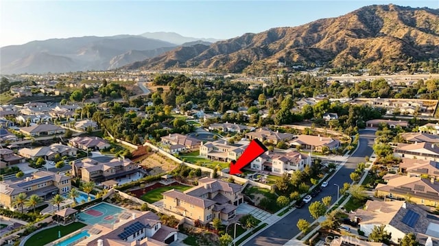 bird's eye view featuring a residential view and a mountain view