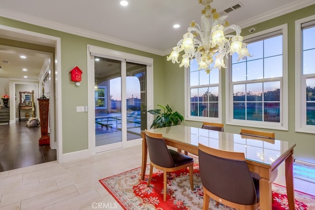dining space featuring visible vents, recessed lighting, a notable chandelier, and ornamental molding