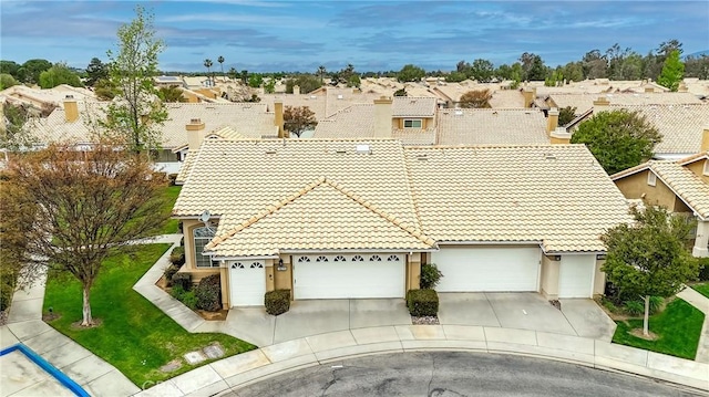 birds eye view of property with a residential view