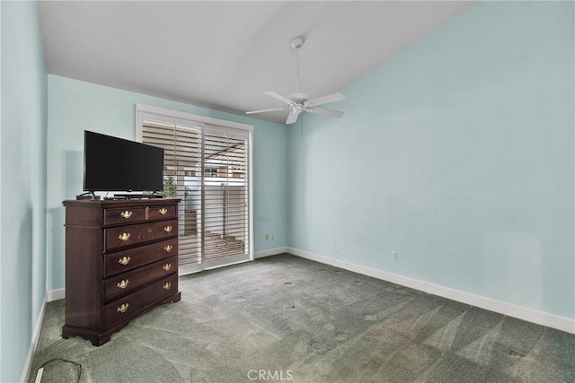 unfurnished bedroom with ceiling fan, carpet floors, and baseboards