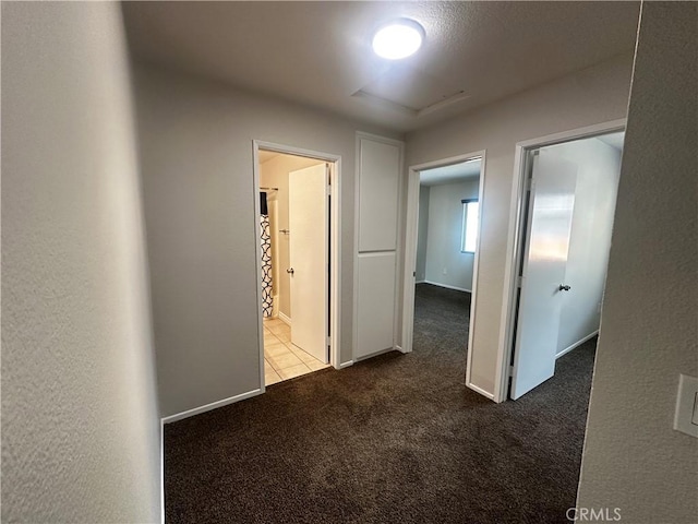 hall with carpet floors