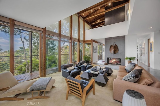 1503 Skylark Ln, Los Angeles, CA 90069 - living room with high vaulted ceiling, floor to ceiling windows, a fireplace, beam ceiling, and wooden ceiling