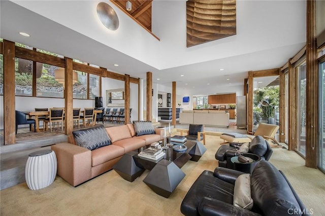 1503 Skylark Ln, Los Angeles, CA 90069 - living area with a towering ceiling, carpet, and recessed lighting