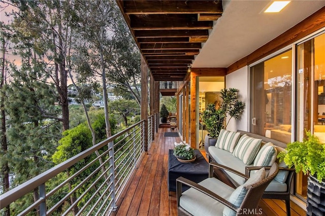 1503 Skylark Ln, Los Angeles, CA 90069 - balcony at dusk featuring outdoor lounge area