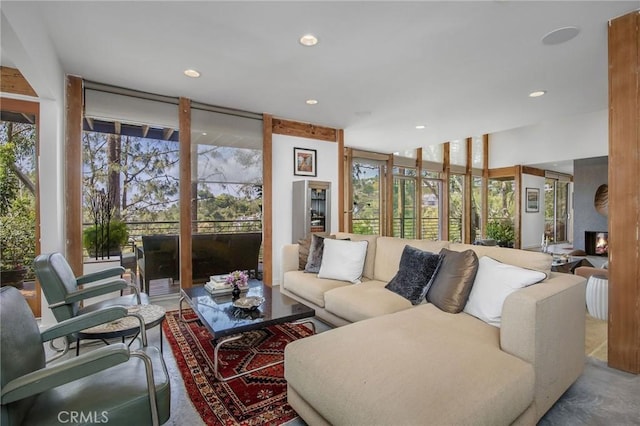 1503 Skylark Ln, Los Angeles, CA 90069 - living room featuring floor to ceiling windows, recessed lighting, and a wealth of natural light