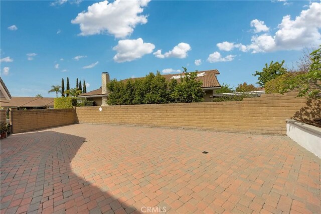 view of patio with fence