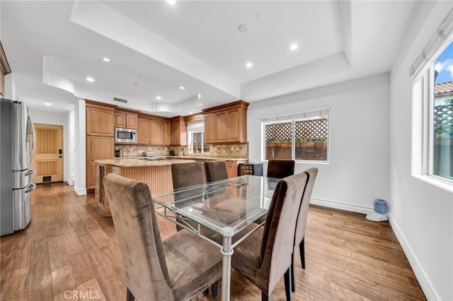 1907 Ernest Ave Unit B, Redondo Beach, CA 90278 - dining room with a raised ceiling, baseboards, wood finished floors, and recessed lighting