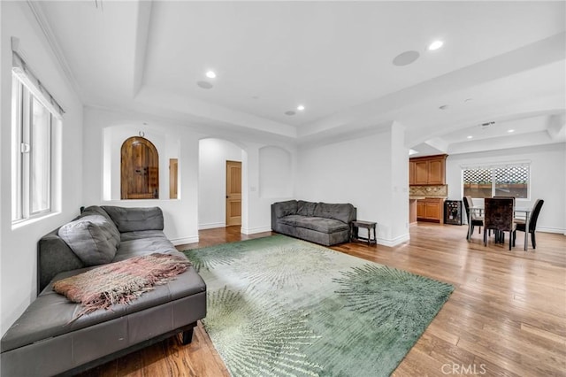 1907 Ernest Ave Unit B, Redondo Beach, CA 90278 - living room with a raised ceiling, arched walkways, recessed lighting, light wood finished floors, and baseboards