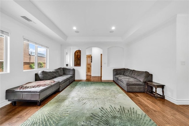 1907 Ernest Ave Unit B, Redondo Beach, CA 90278 - living room with arched walkways, wood finished floors, a tray ceiling, baseboards, and recessed lighting