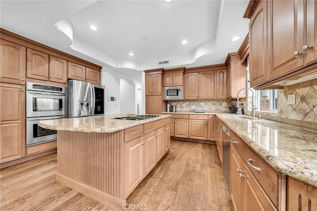 1907 Ernest Ave Unit B, Redondo Beach, CA 90278 - kitchen featuring appliances with stainless steel finishes, a sink, a kitchen island, light wood-style floors, and recessed lighting
