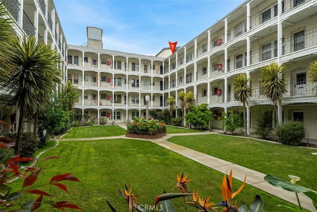 surrounding community featuring a lawn