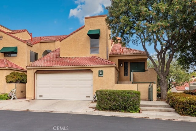 2903 Yucatan Pl Unit A, Diamond Bar, CA 91765 - mediterranean / spanish house featuring a tiled roof, driveway, and stucco siding