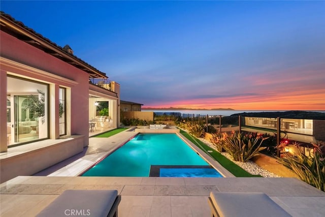 31 Seawatch, Newport Coast, CA 92657 - view of pool featuring a patio area, a pool with connected hot tub, and a fenced backyard