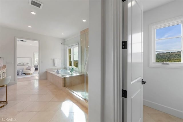 31 Seawatch, Newport Coast, CA 92657 - ensuite bathroom featuring tile patterned floors, recessed lighting, a bath, baseboards, and a stall shower
