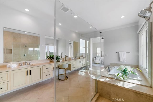 31 Seawatch, Newport Coast, CA 92657 - full bath with a stall shower, vanity, tile patterned floors, a bath, and recessed lighting