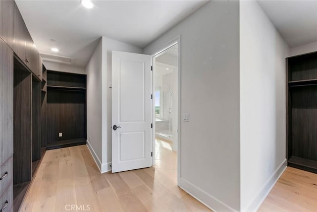31 Seawatch, Newport Coast, CA 92657 - hallway featuring light wood-style flooring, baseboards, and recessed lighting