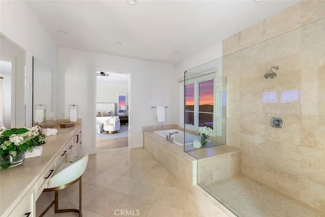 31 Seawatch, Newport Coast, CA 92657 - full bath featuring tile patterned flooring, a bath, ensuite bath, vanity, and tiled shower
