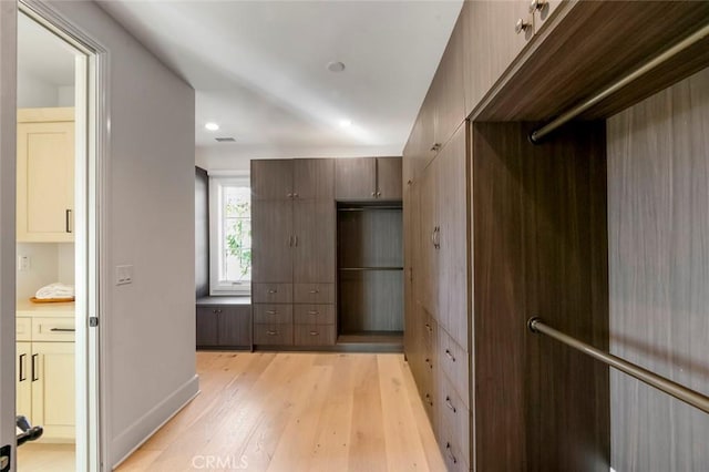 31 Seawatch, Newport Coast, CA 92657 - walk in closet with light wood finished floors