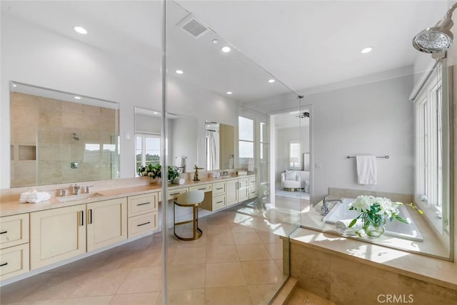 31 Seawatch, Newport Coast, CA 92657 - full bath featuring a stall shower, vanity, a garden tub, tile patterned flooring, and recessed lighting