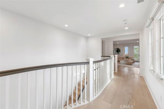 31 Seawatch, Newport Coast, CA 92657 - corridor featuring recessed lighting, light wood finished floors, and an upstairs landing