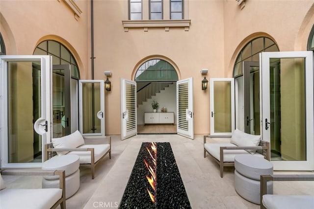 31 Seawatch, Newport Coast, CA 92657 - view of patio / terrace with an outdoor fire pit and french doors