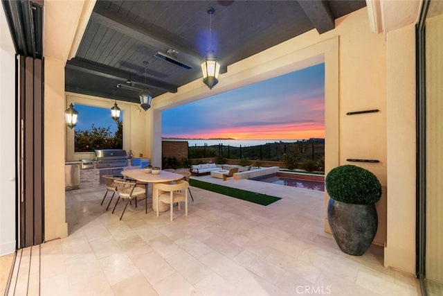31 Seawatch, Newport Coast, CA 92657 - patio terrace at dusk featuring outdoor dining area and a patio