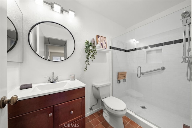 bathroom with toilet, a stall shower, tile patterned flooring, and vanity