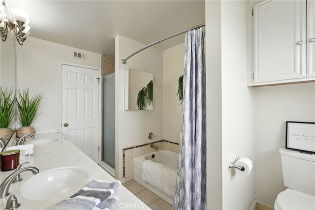 5447 E Centralia St, Long Beach, CA 90808 - full bathroom with a garden tub, a shower with shower curtain, toilet, tile patterned flooring, and double vanity