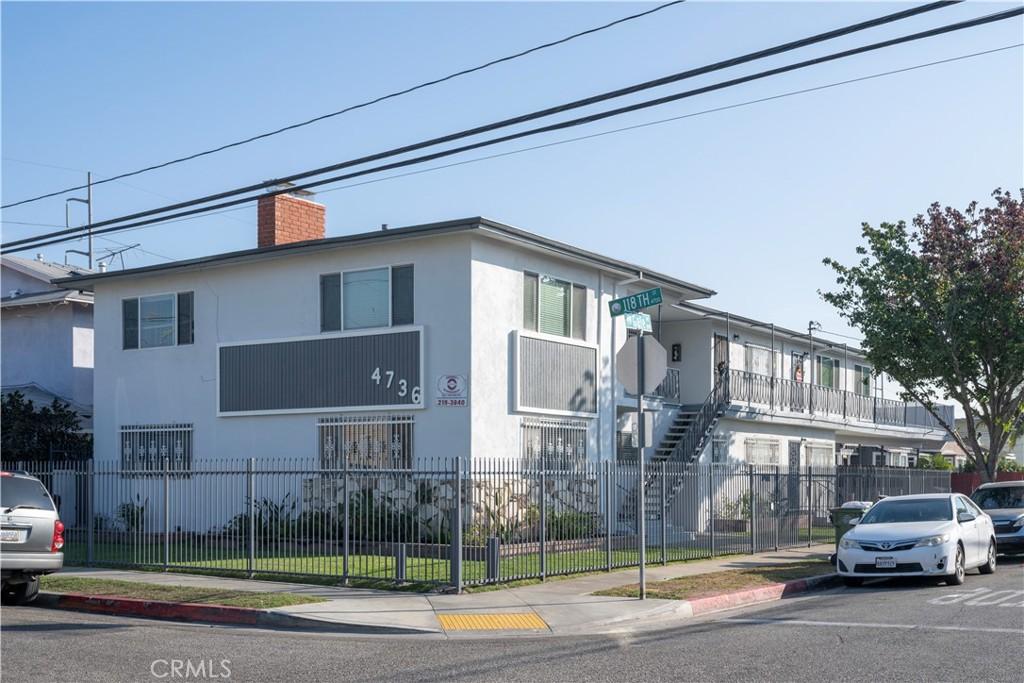 view of building exterior featuring a fenced front yard