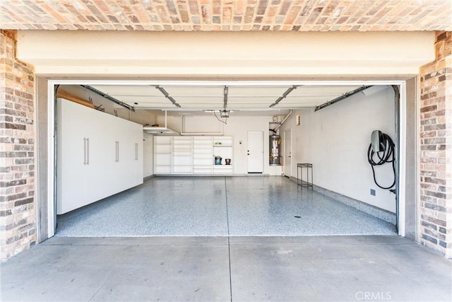 garage featuring water heater