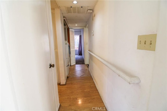 hall with light wood-style floors