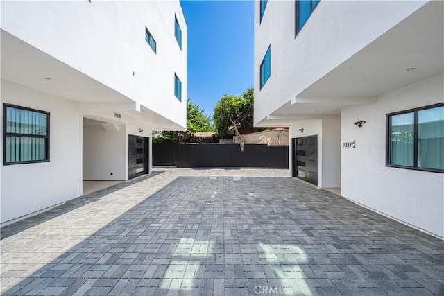 view of patio / terrace featuring fence