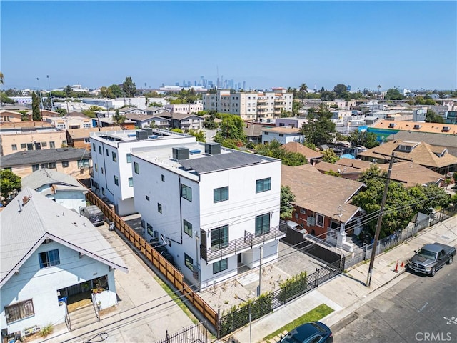 birds eye view of property featuring a view of city