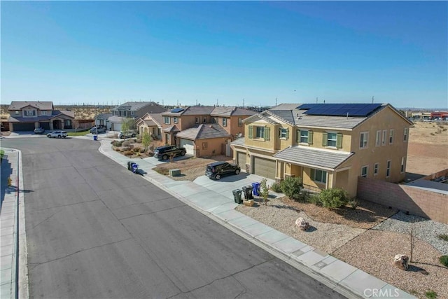 exterior space with curbs and a residential view