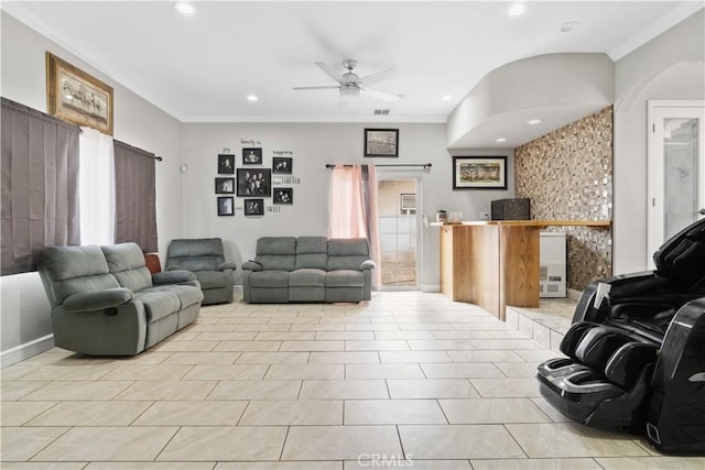 living area with crown molding, recessed lighting, a ceiling fan, and light tile patterned floors