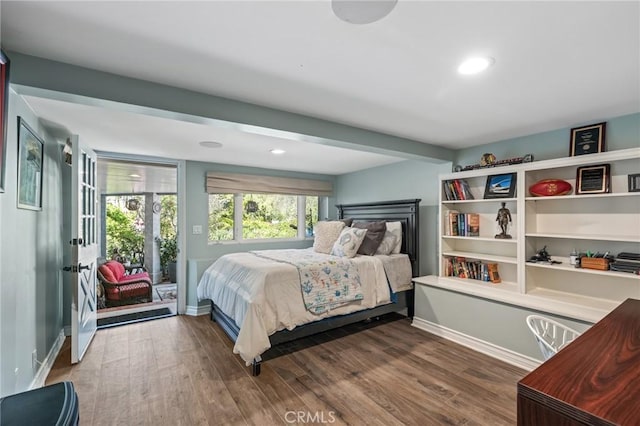 bedroom featuring baseboards, access to outside, recessed lighting, and wood finished floors