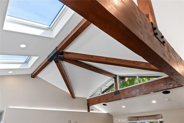 room details featuring recessed lighting, a skylight, and beam ceiling